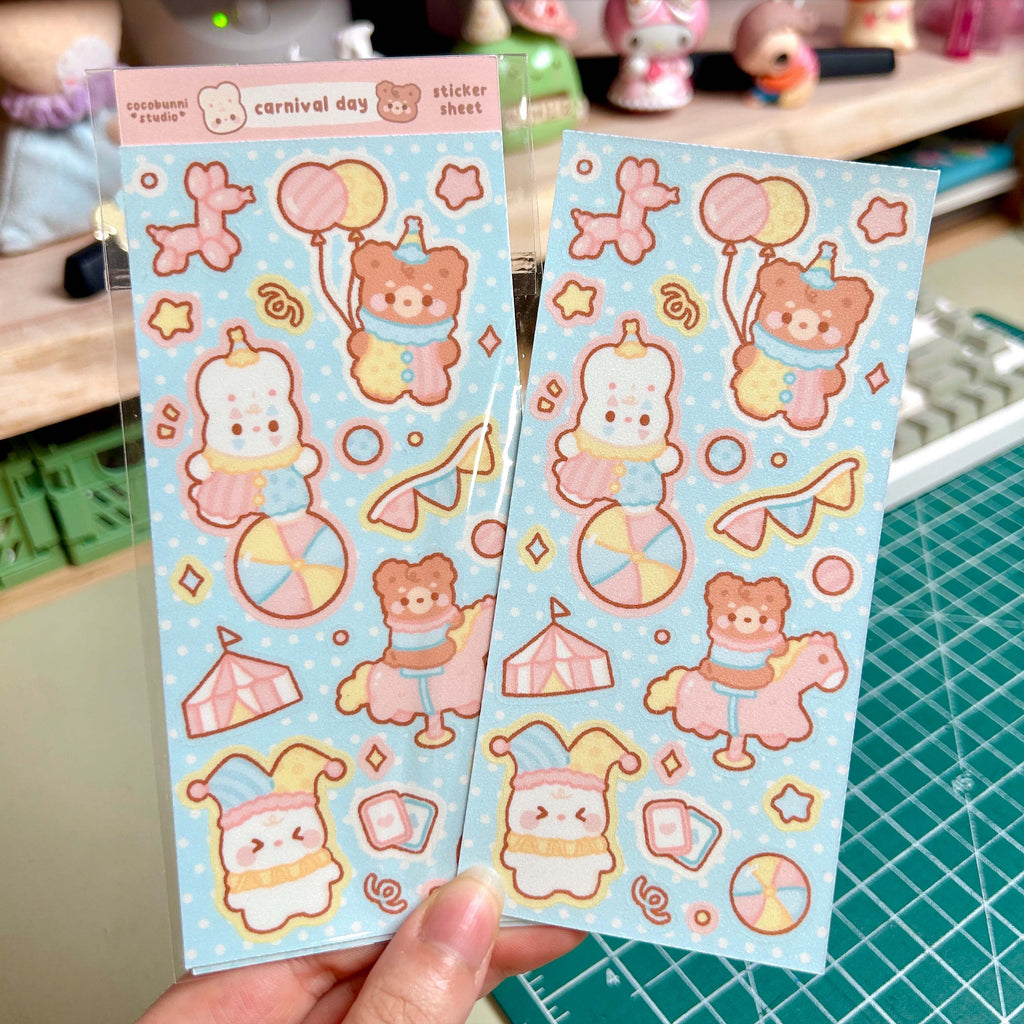 Two sticker sheets with cartoon characters on a cutting mat.